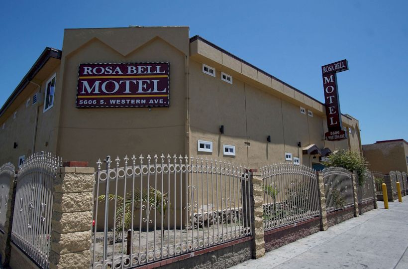 A beige building with signage reading 